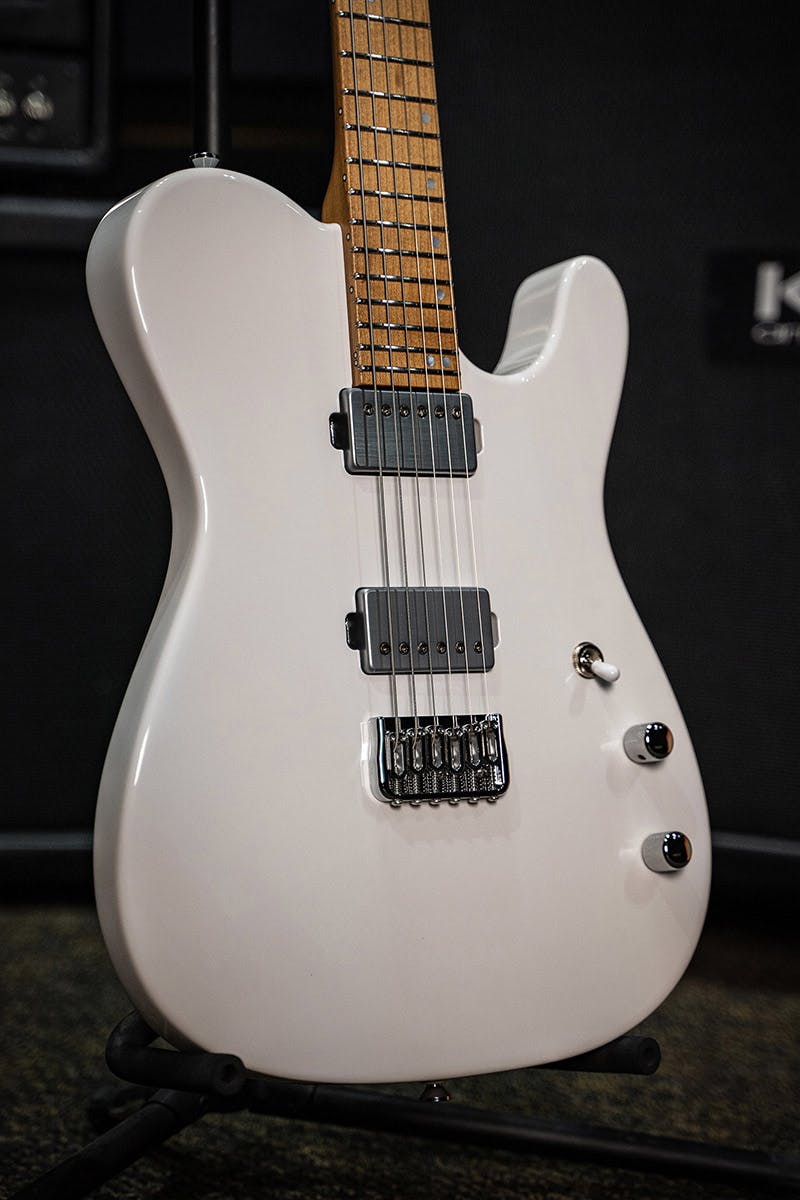 Kiesel Guitars Solo S6H with white/white finish, chrome hardware, chrome pickup covers, maple fingerboard, mother of pearl staggered offset dot inlays, white switch tip