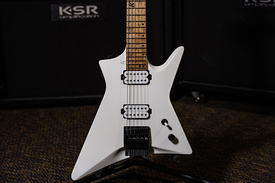 Kiesel Guitars Lightspeed with White/White finish, white pickup coils, dropshadow white over black K logo, roasted birdseye maple fingerboard, black acrylic 12th fret k logo with staggered offset dot inlays, black hardware