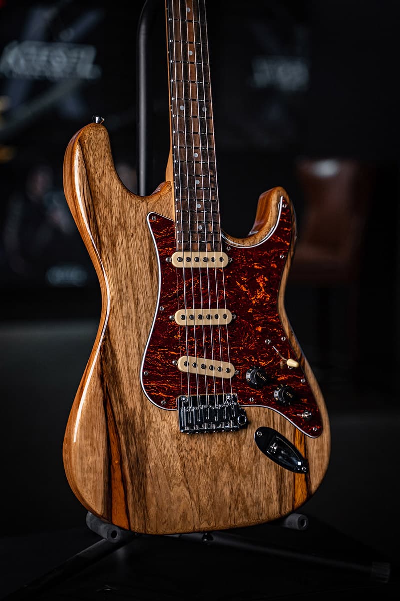 Kiesel Guitars delos gotoh tremolo D6G with black limba body, red tortoise shell pickguard, cream pickup coils, chrome hardware, royal ebony fingerboard, mother of pearl dot inlays, black plastic knobs
